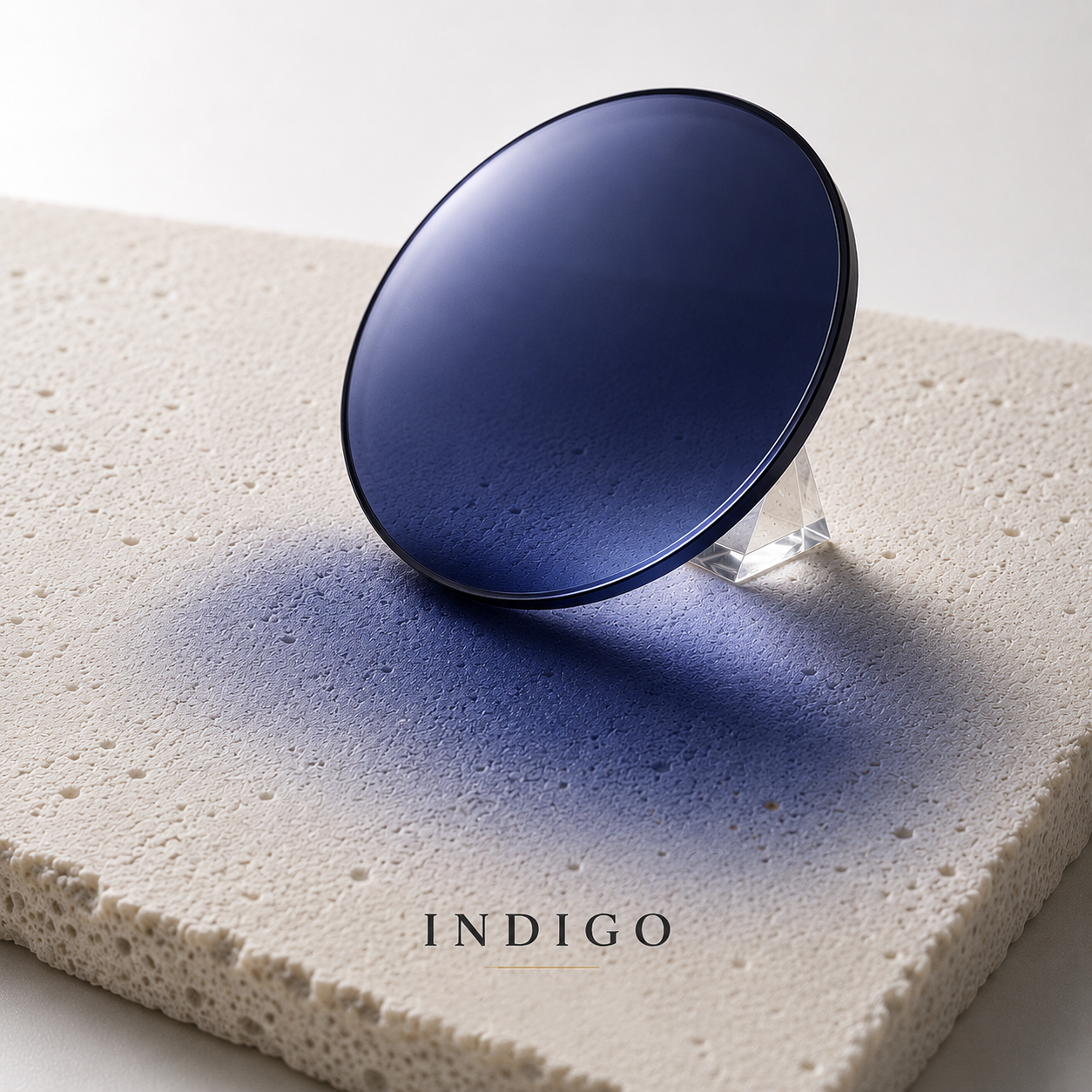 Bespoke Marma Dinamica Indigo photochromic lens by Lens Art for luxury prescription reglazing and custom lens design.