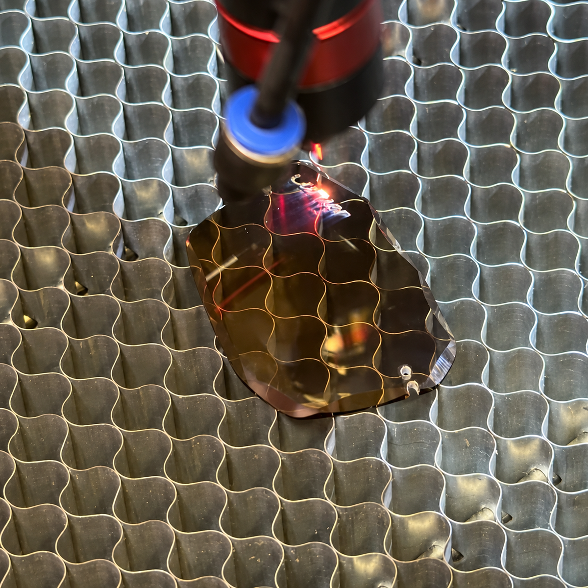 Close-up of custom lens engraving for bespoke prescription lens design by Lens Art