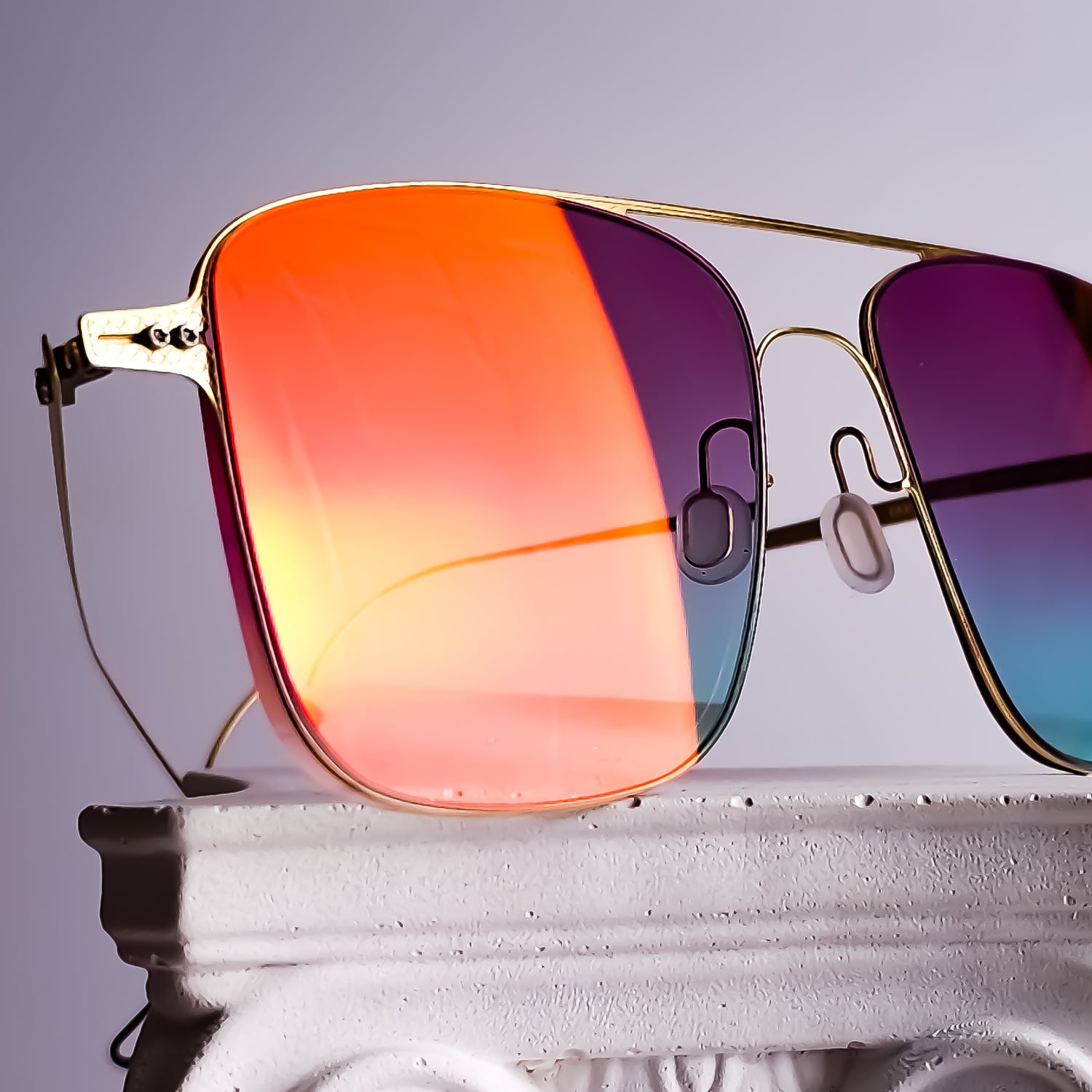Luxury reglazing of Lucas de Staël Undostrial Fuse eyewear with bespoke custom tinted prescription lenses, Marma Dinamica photochromic technology and a premium red flash mirror by Lens Art®.