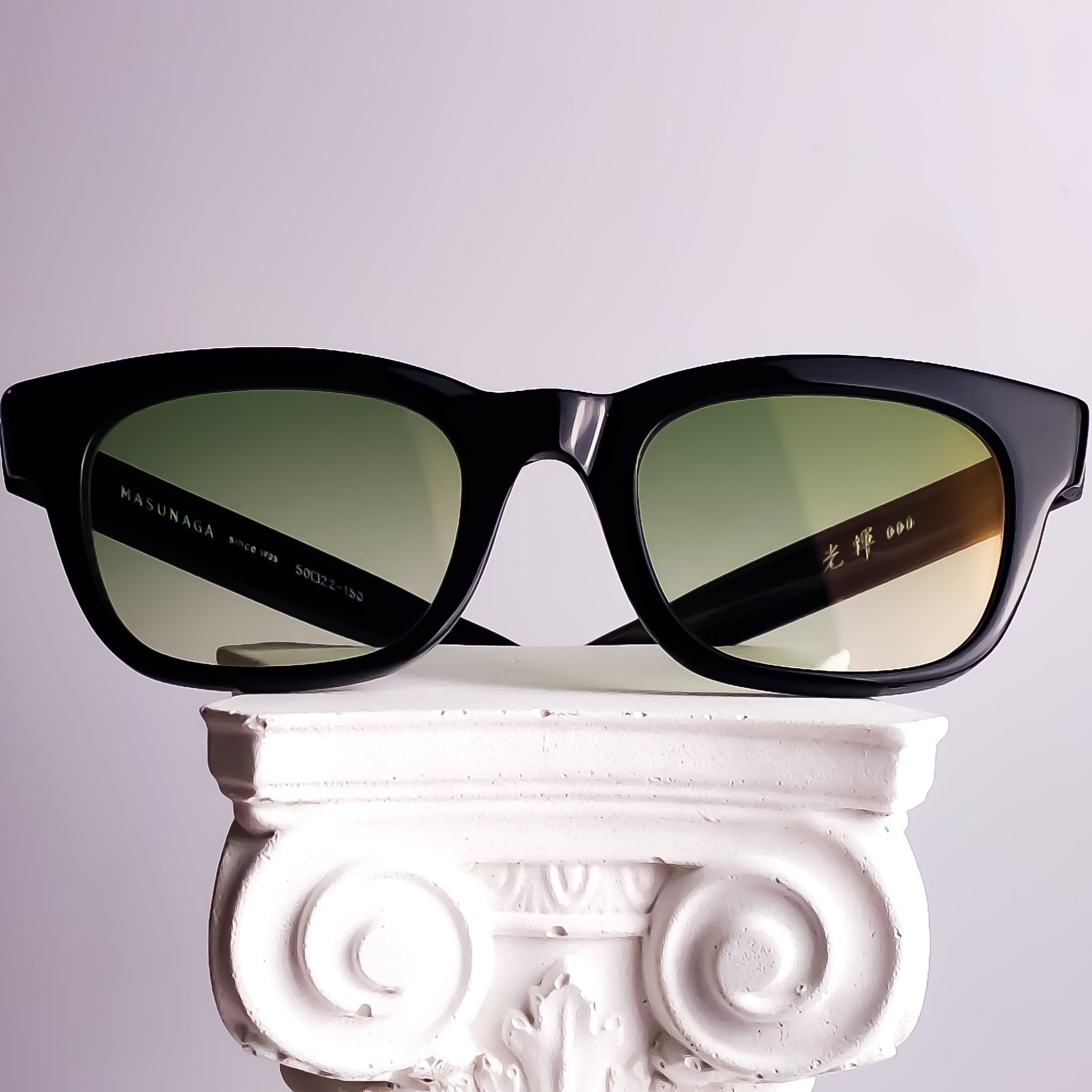 Luxury reglazing of Masunaga 000 eyewear with bespoke gradient prescription lenses and Marma Dinamica Jade Green photochromic technology, individually designed by Lens Art®.